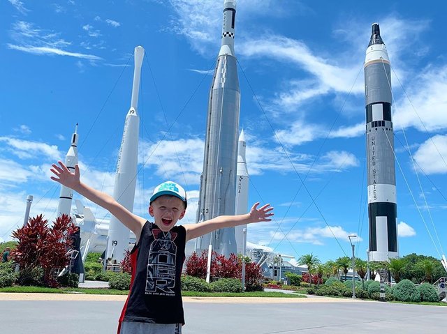 child in rocket garden