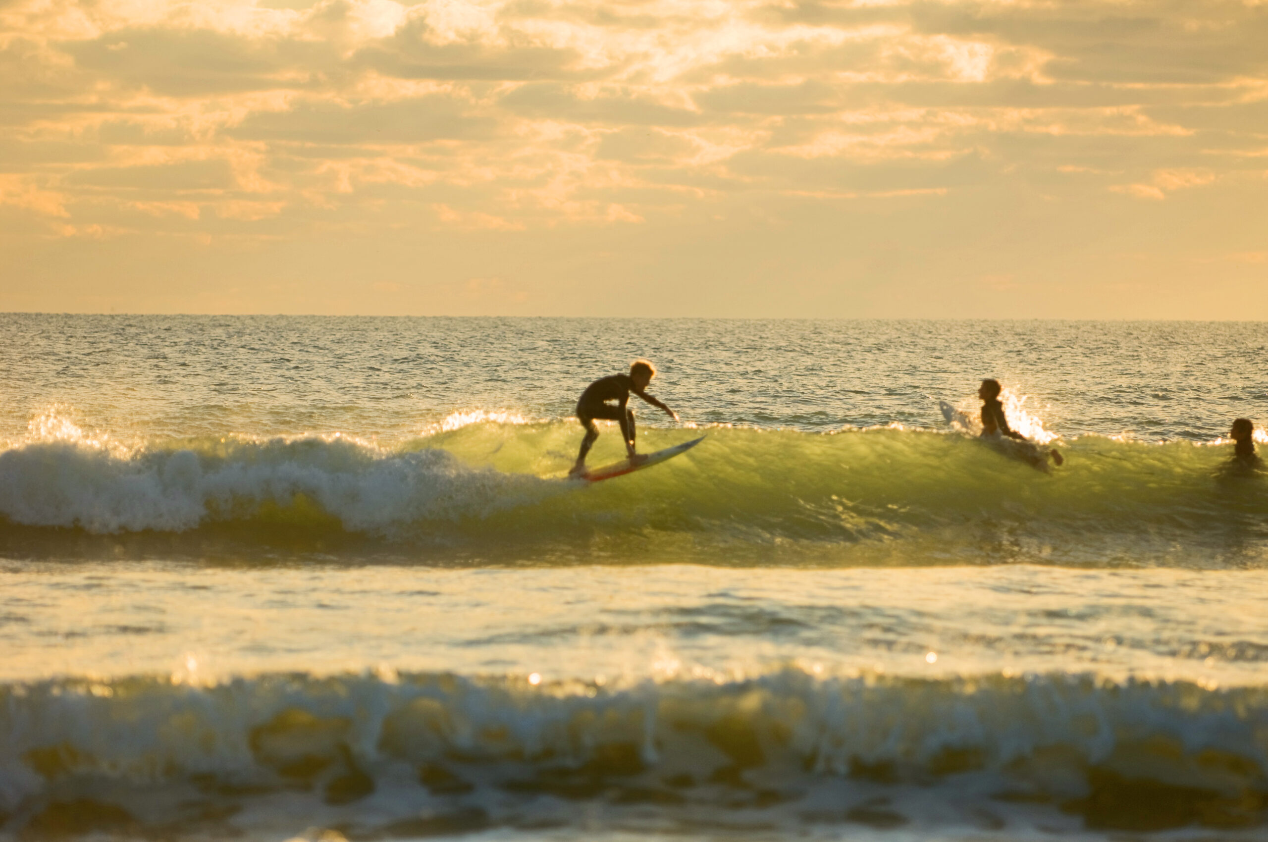 Surfing a wave in Cocoa Beach