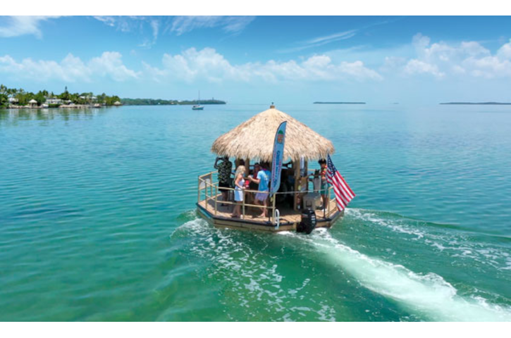 Drone view of guests on a tiki cruise